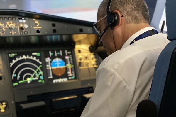 Person sitting in a cockpit